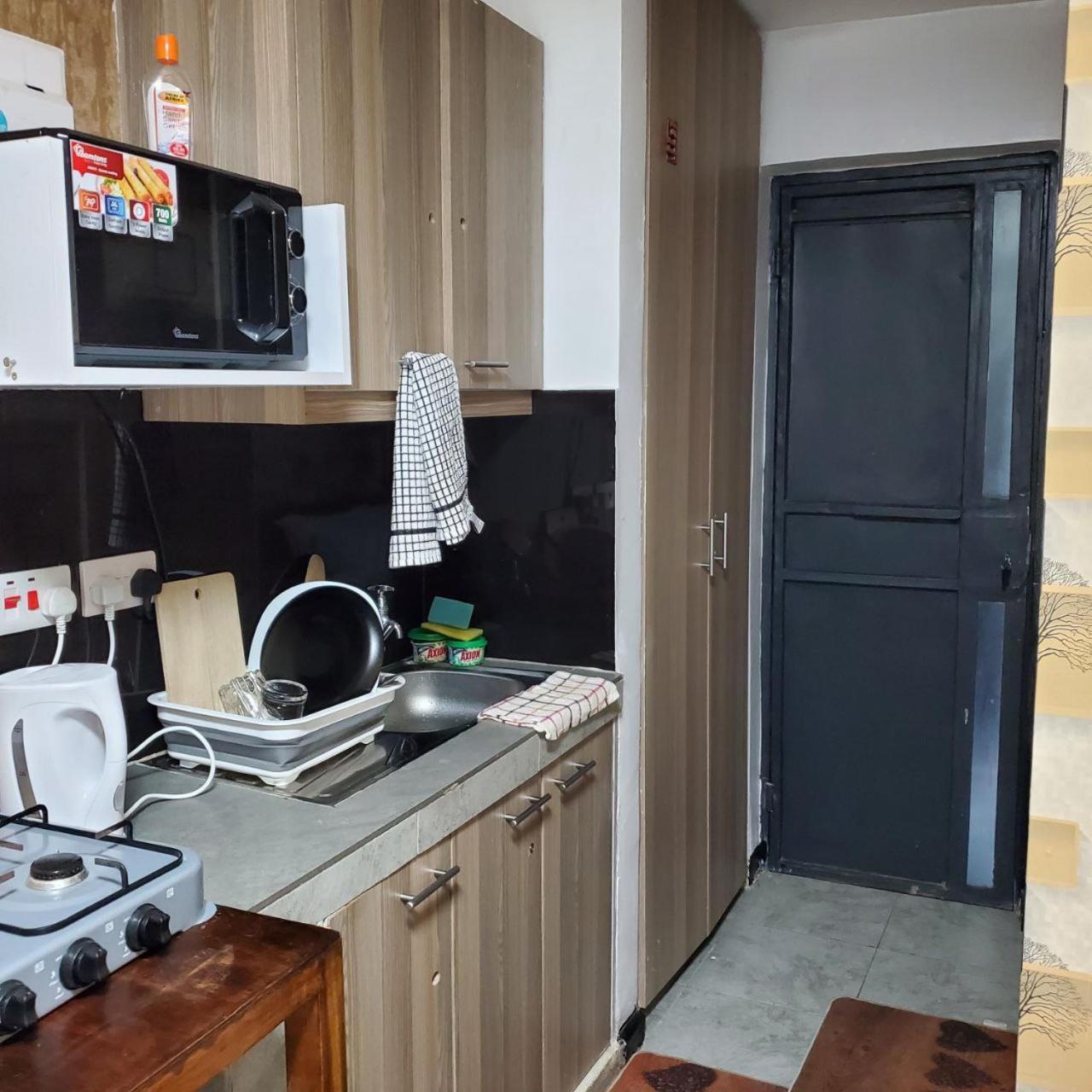 Lovely & Cozy Compact Studio Near Airport With Rooftop View Apartment Nairobi Exterior photo