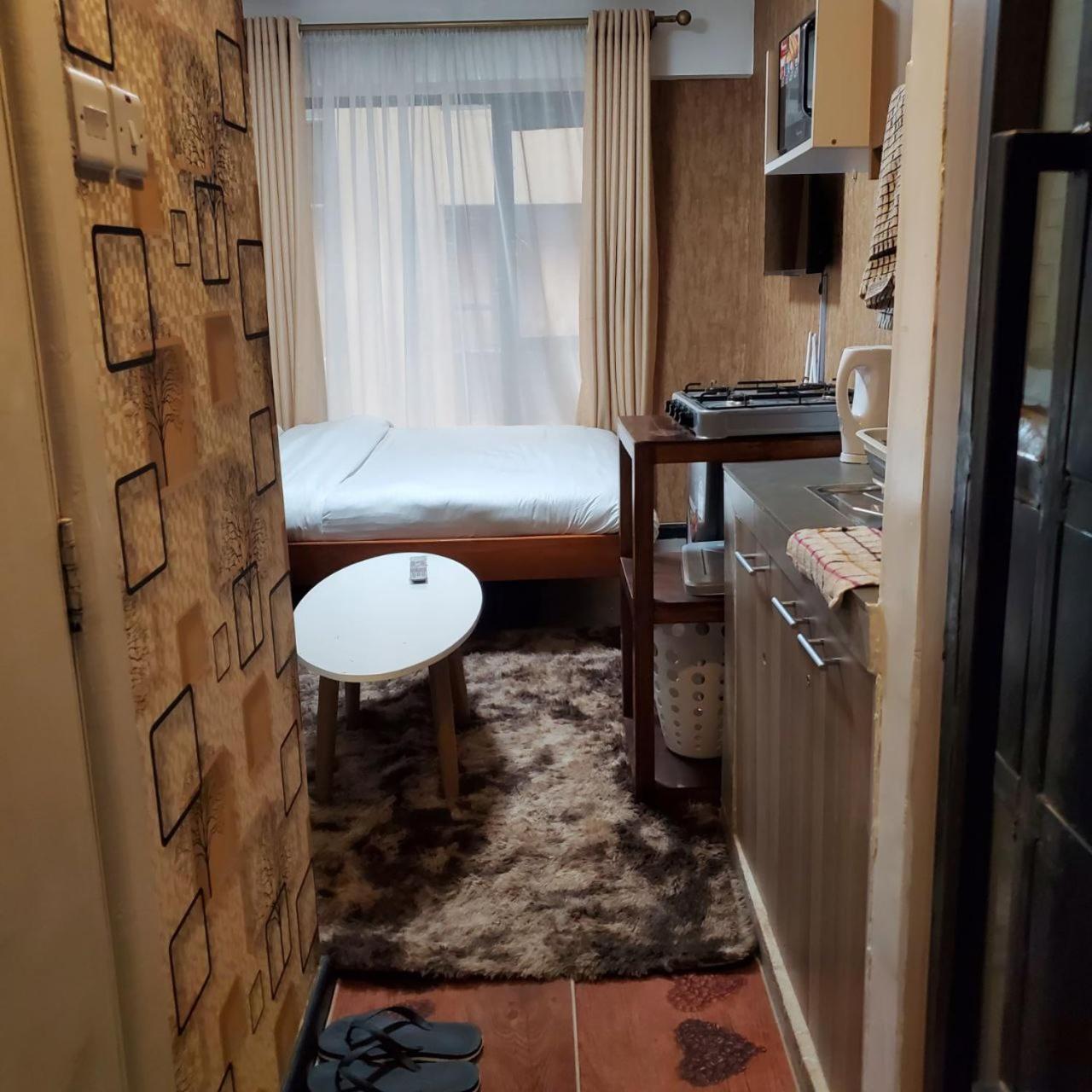 Lovely & Cozy Compact Studio Near Airport With Rooftop View Apartment Nairobi Exterior photo